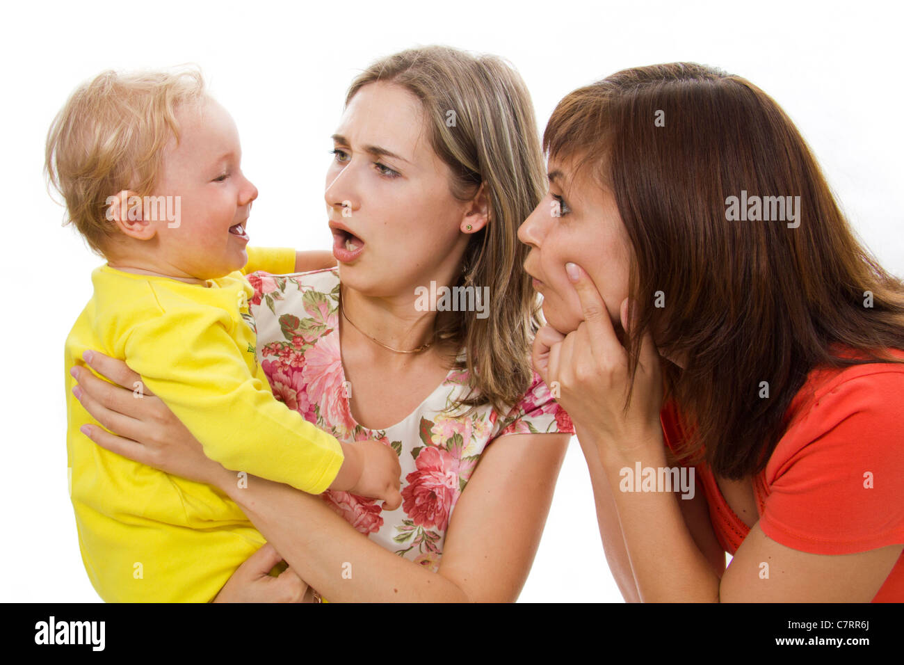 Mother and the aunt have fun together with the child Stock Photo - Alamy