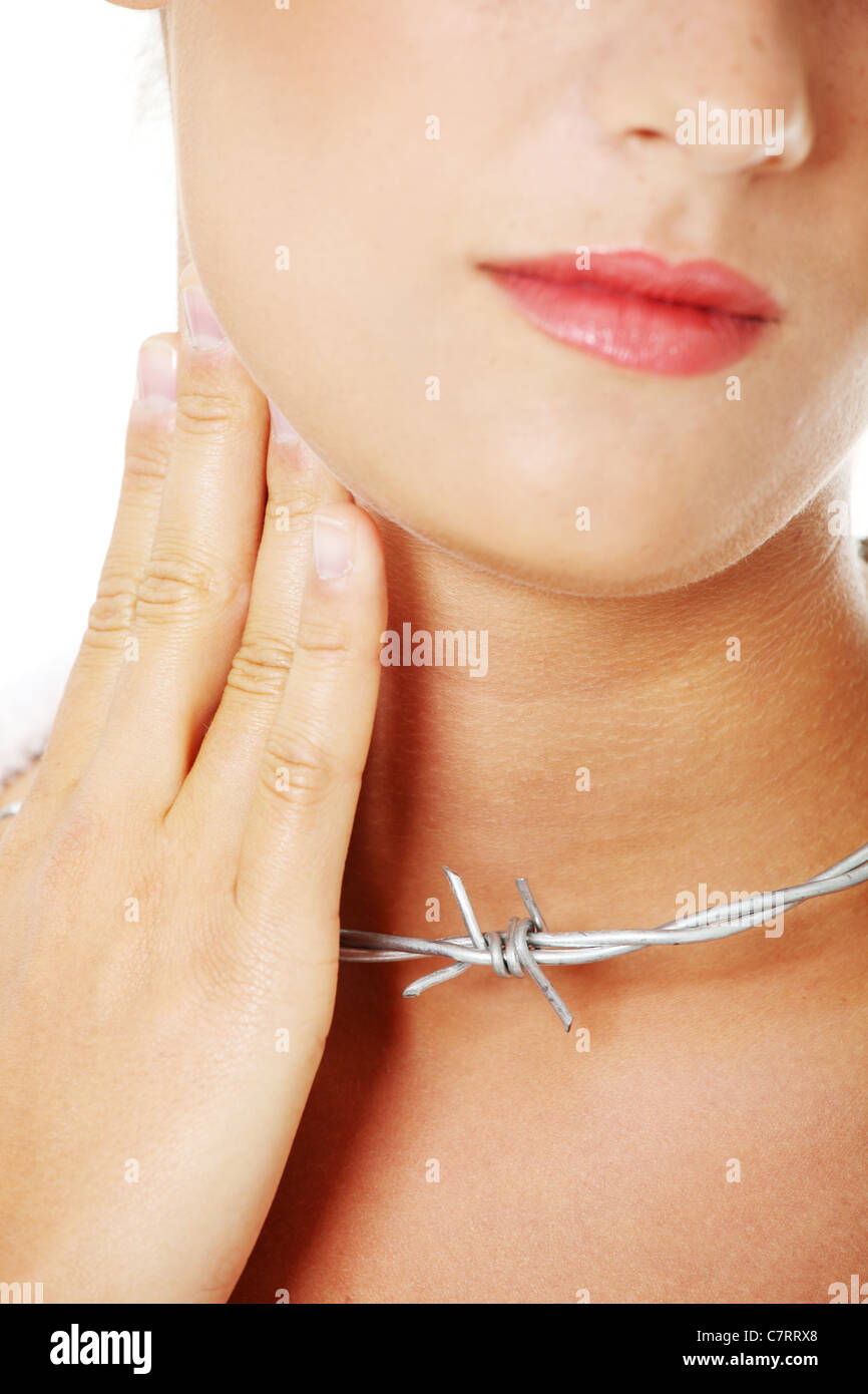 Throat pain concept. Young woman with barbed wire around her throat