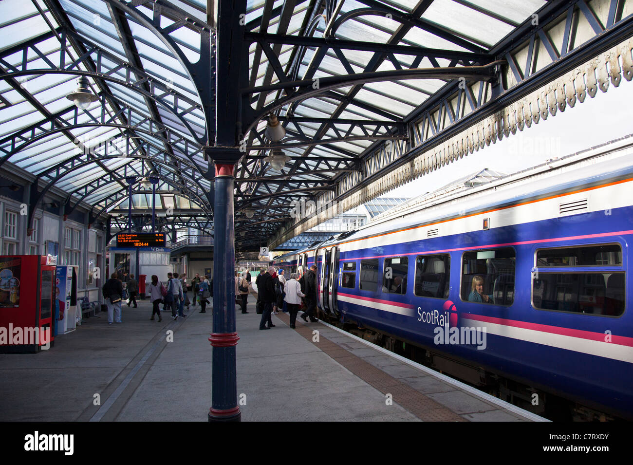 Passengers board train at Stirling rail station, Scotland Scotrail