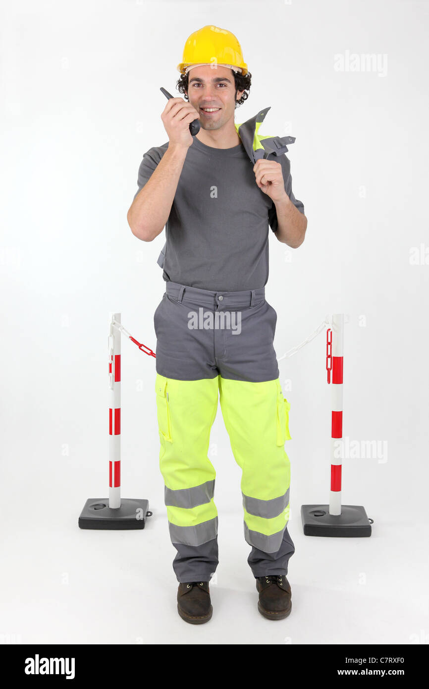 Construction worker with radio receiver Stock Photo Alamy