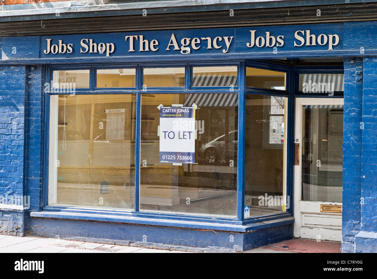 Former jobs agency shop empty and available for letting Stock Photo