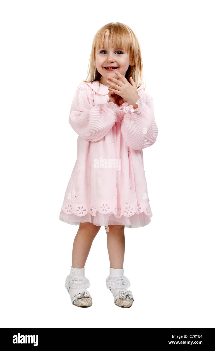 little girl in a pink dress in studio isolated on a white background ...