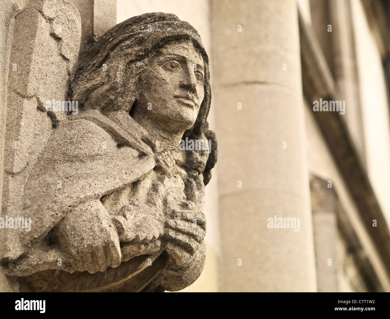Angel stone figure in an old house of Oxford, England, Europe Stock Photo