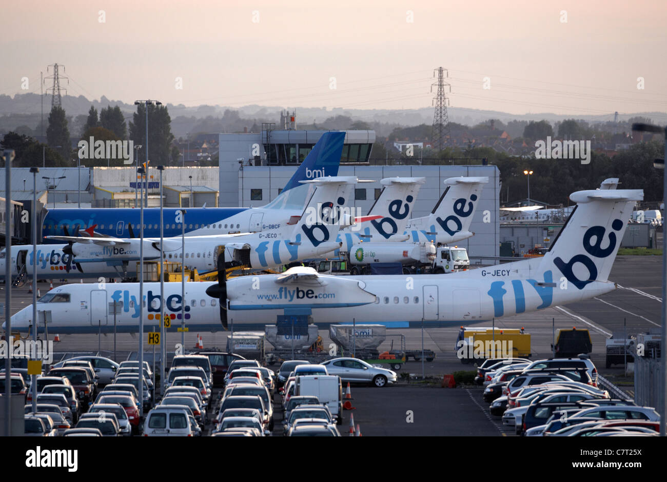 row of flybe aircraft parked on the tarmac at George Best Belfast City Airport, Belfast, Northern Ireland, UK. Stock Photo