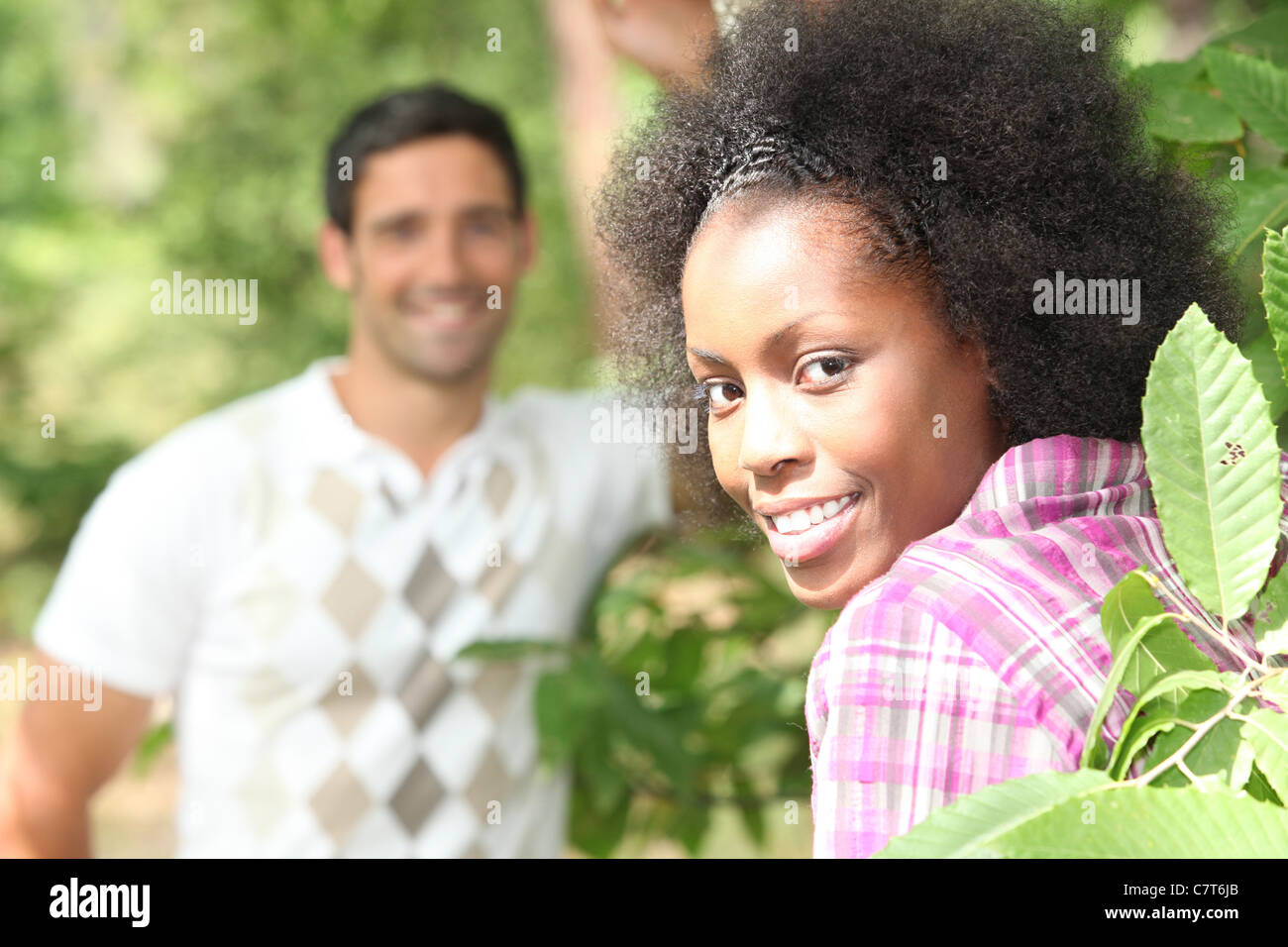 Couple in the woods Stock Photo - Alamy