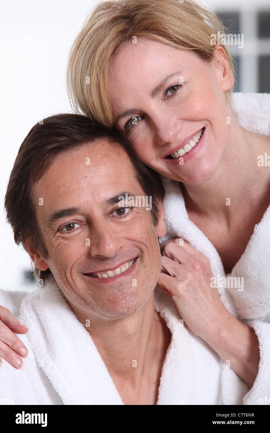 Portrait of loving couple in bathrobes Stock Photo Alamy