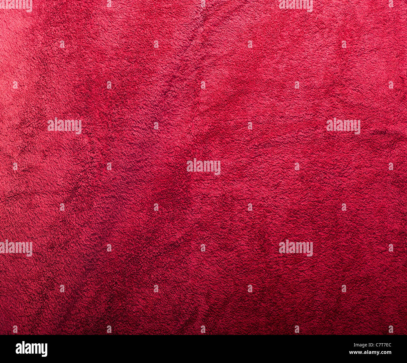 Plush red fabric texture in detail Stock Photo