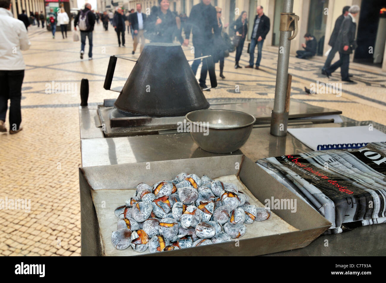 Portugal, Lisbon: Stand with roasted chestnuts in the shopping mall Rua Augusta Stock Photo