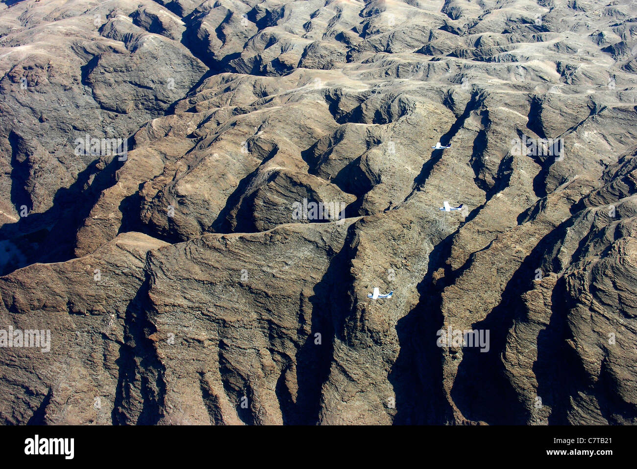 Africa, Namibia, aerial view of the desert and Cessna 210 airplane Stock Photo