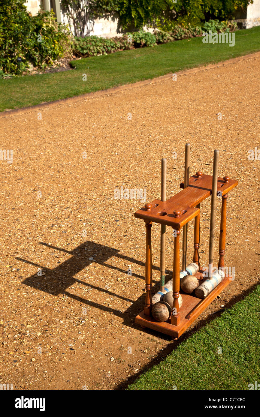 Croquet Bats and Balls in Wooden Stand Stock Photo Alamy