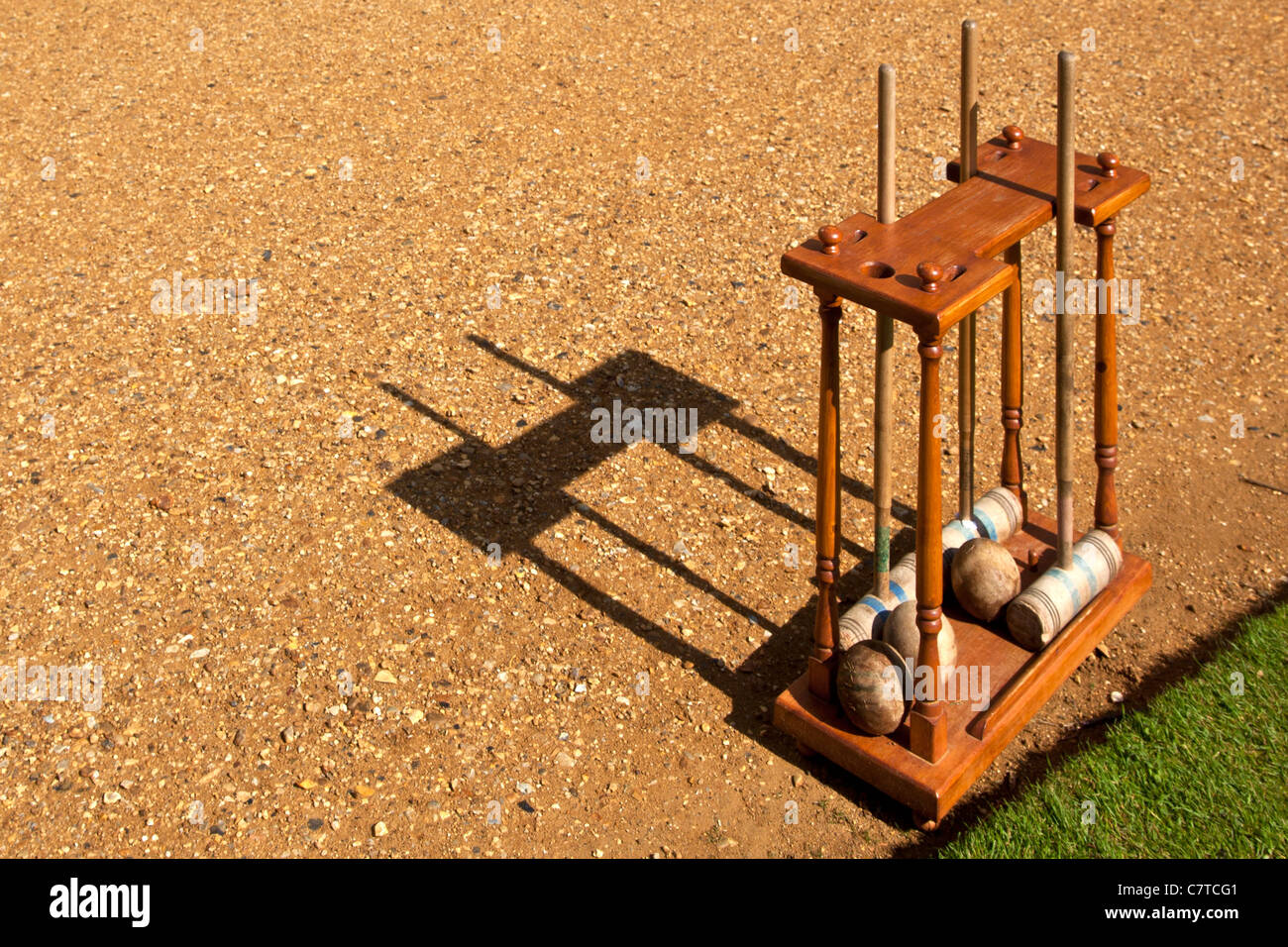 Croquet Bats and Balls in Wooden Stand Stock Photo Alamy