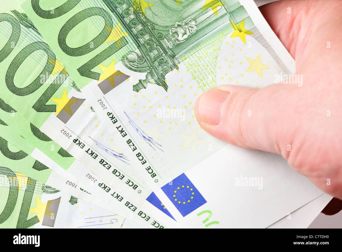 100 euro banknotes in hand close up Stock Photo
