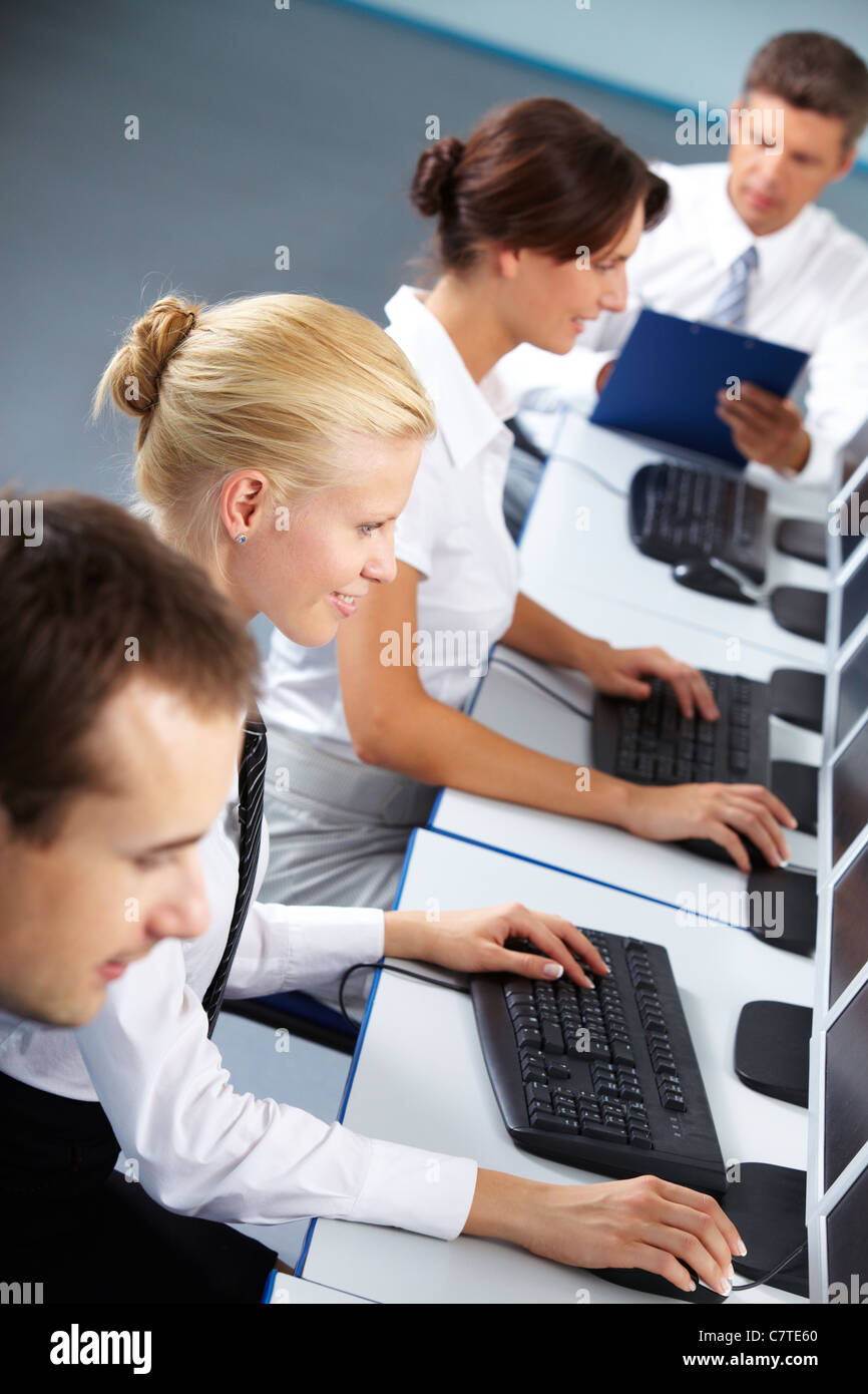 Office workers using computers hi-res stock photography and images - Alamy