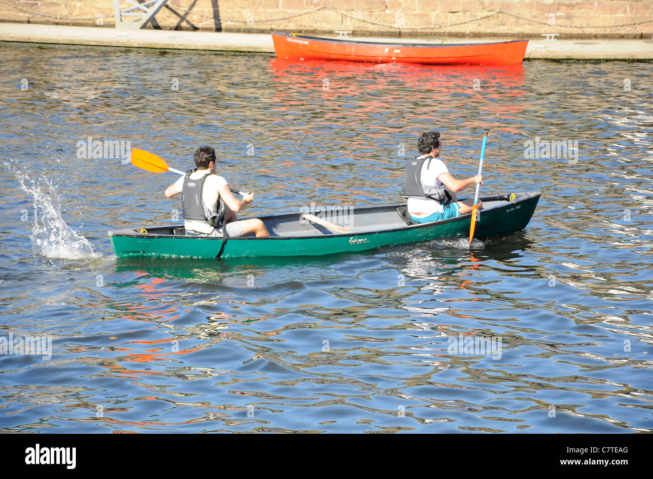 People paddling Canoe in the River Exe at Exeter Quay Stock Photo Alamy