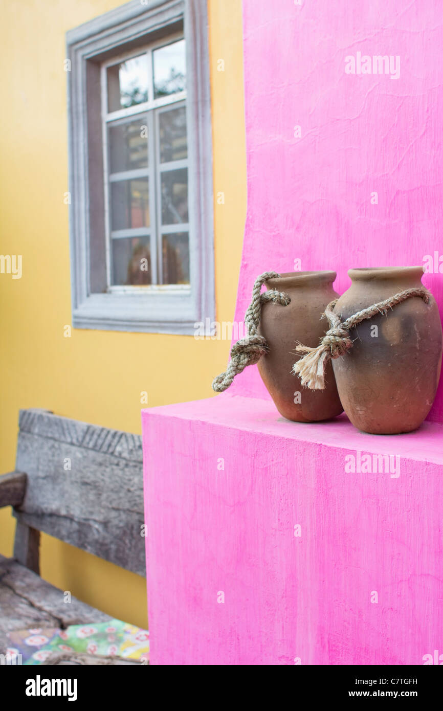 Architectural detail, clay pots, colorful wall, outdoor patio, Ajijic, Jalisco, Mexico, Latin America. Stock Photo