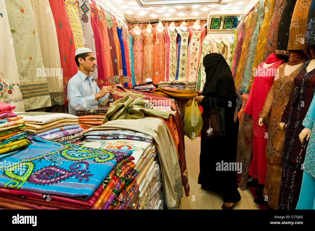 Dubai, United Arab Emirates, Deira, interior of a textile shop Stock Photo