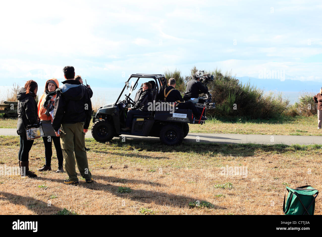 Film crew in jeep filming scene for TV movie in Canada called New Girl Stock Photo