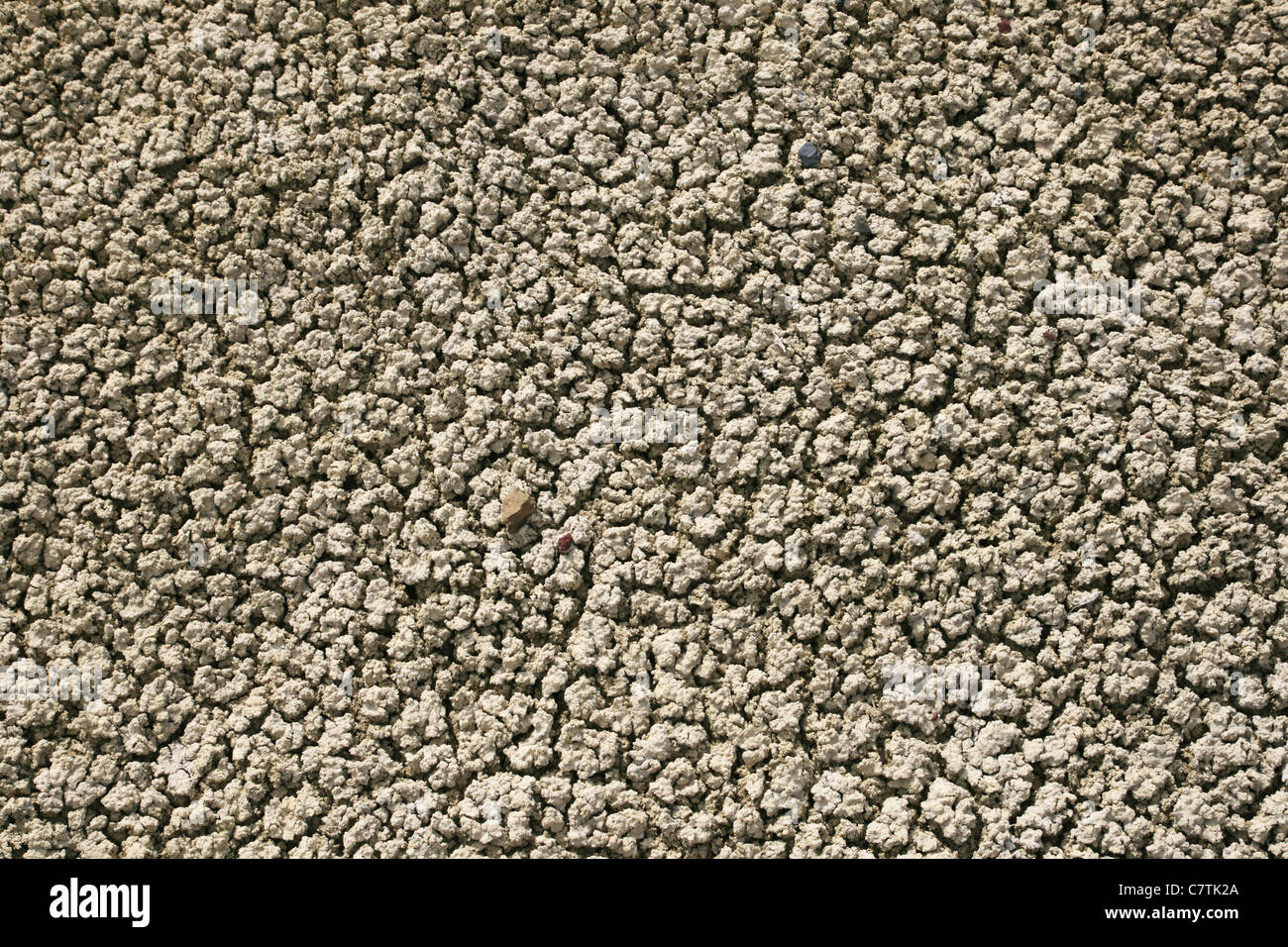 cracked textured dried clay soil for background texture Stock Photo