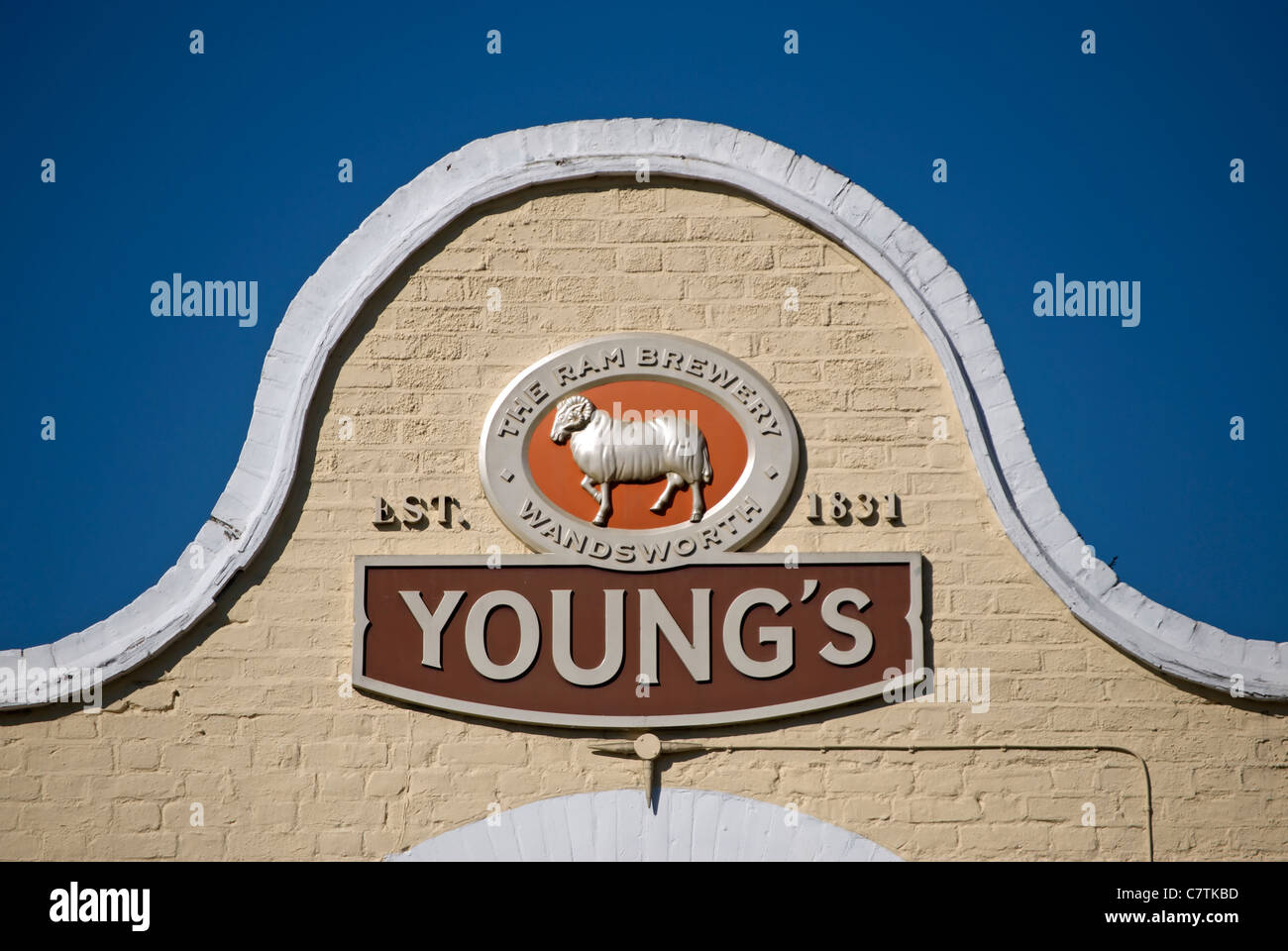 ram logo of young's brewery, forming part of the roofline of the marble hill pub, twickenham, middesex, england Stock Photo
