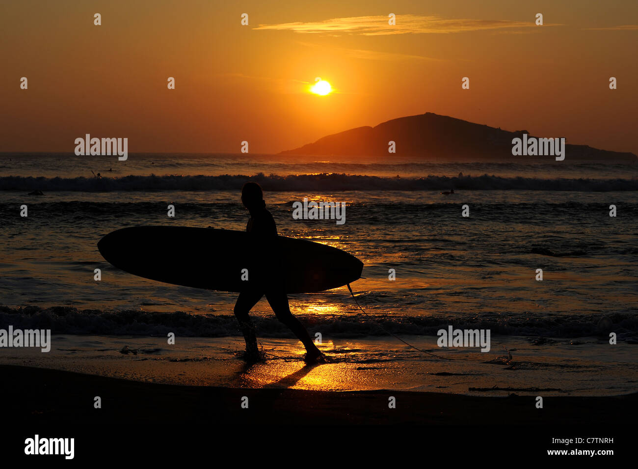 Female surfer beach sunset hi-res stock photography and images - Alamy
