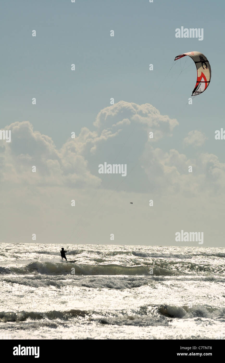 Kite-Boarder plays in the ocean off the Texas coastline, Gulf of Mexico, USA. Stock Photo