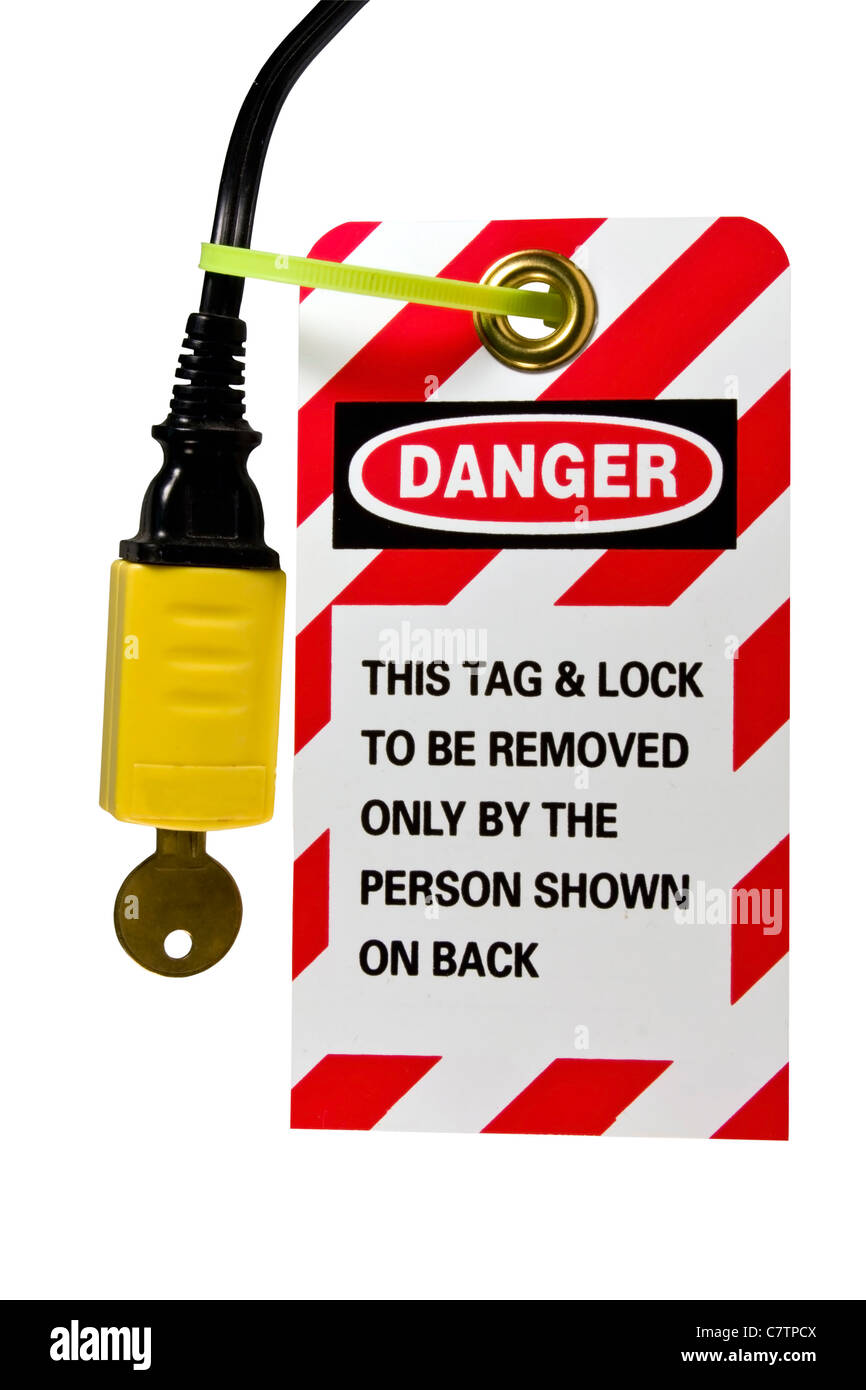 lock out tag out sign and lock on an electrical cord isolated with
