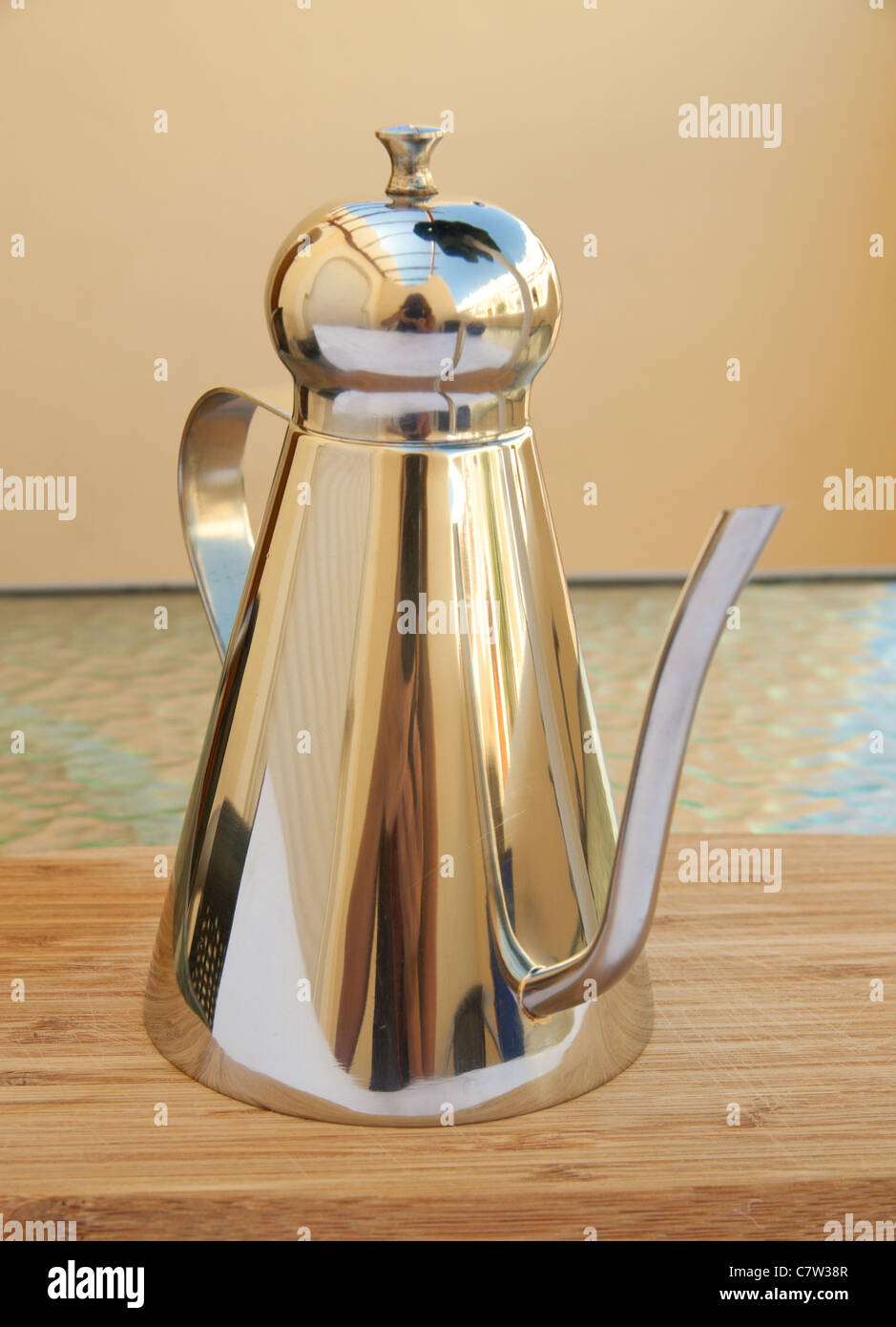 stainless steel vessel for olive oil Stock Photo
