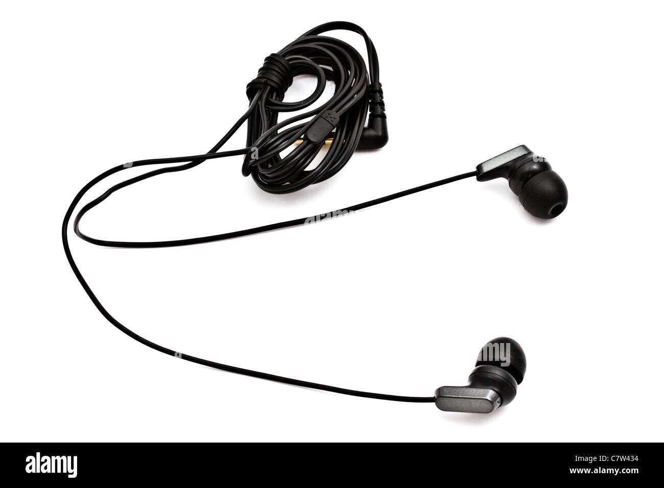 Black earphone closeup on white background Stock Photo Alamy