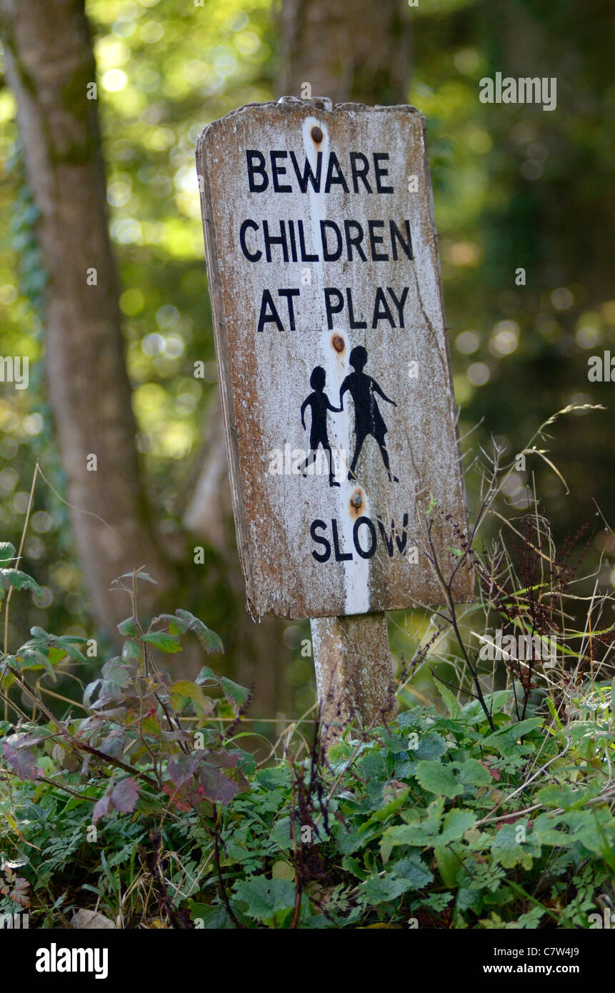 Beware children at play sign in woods Stock Photo