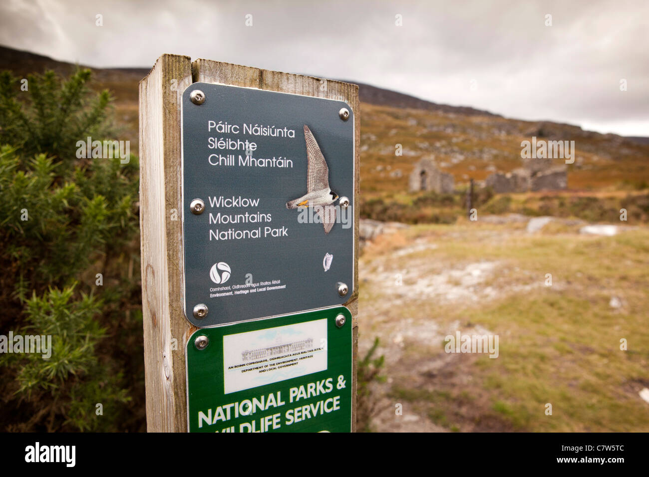 Ireland, Co Wicklow, Wicklow Mountains national park sign, at old ruined granite worker’s house Stock Photo