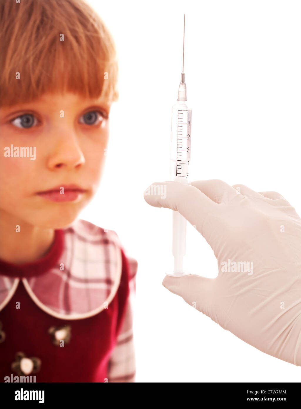 Child look at hand with syringe Stock Photo - Alamy