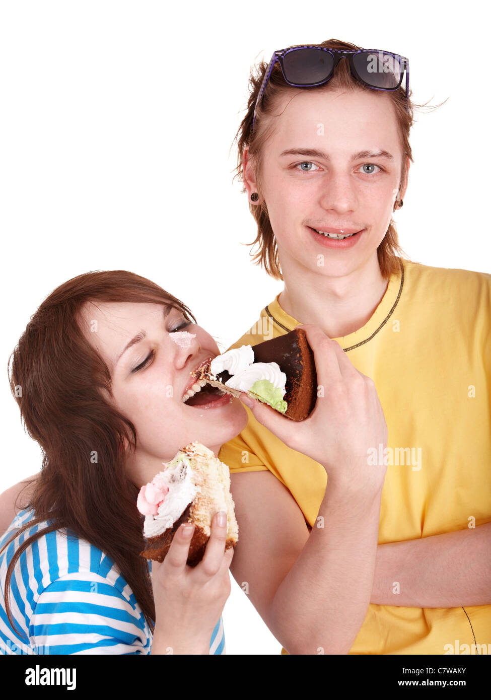 Man  and girl eating cake. Stock Photo