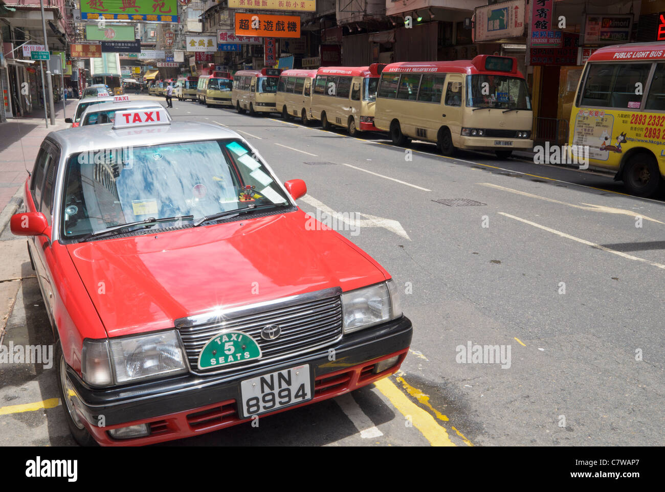 Hong Kong taxis and minibuses in Kowloon Stock Photo
