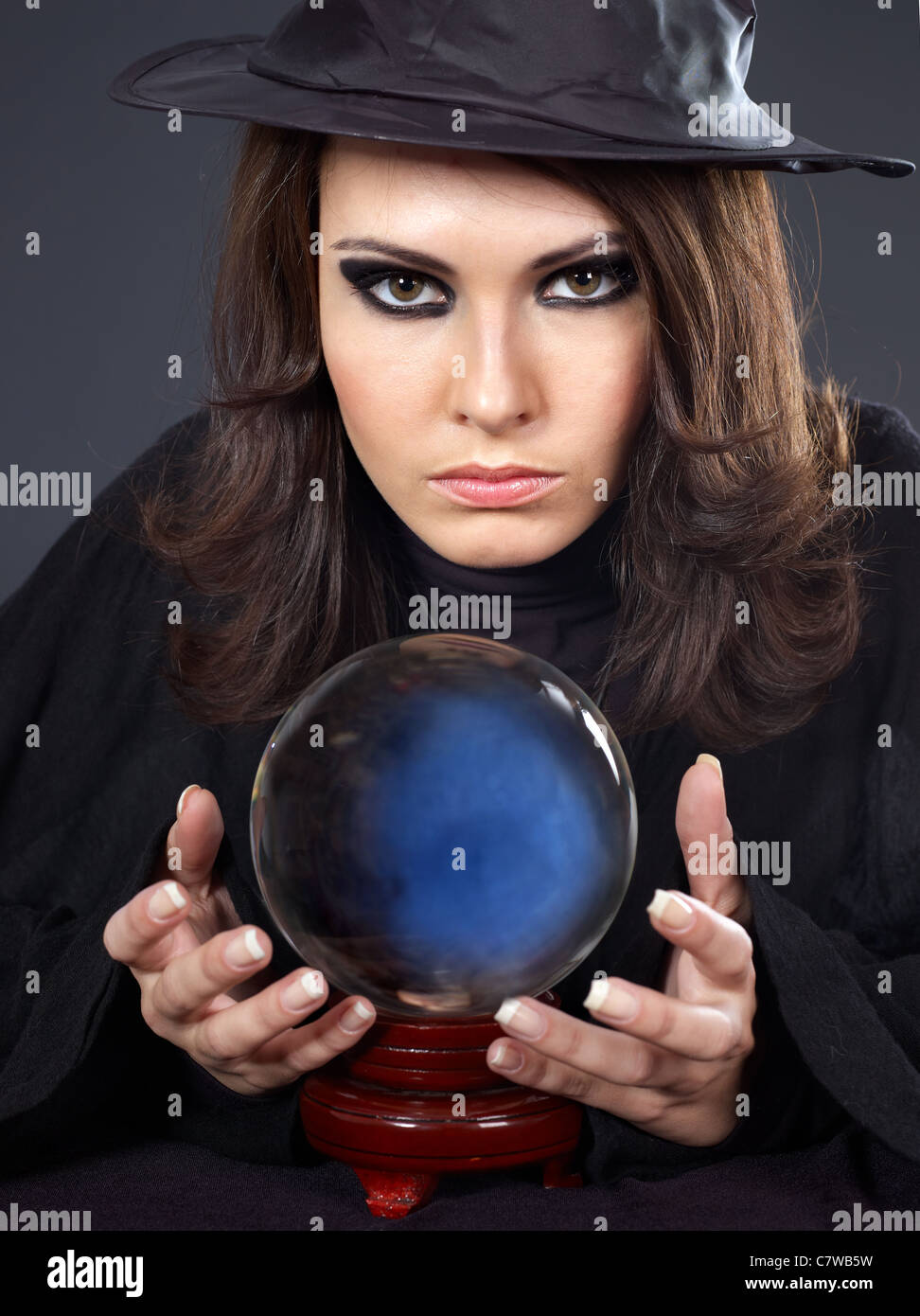 Woman with crystal ball. Fortune telling Stock Photo - Alamy