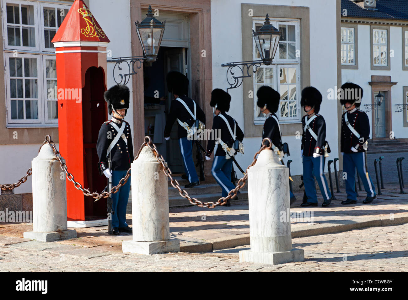 Bearskin sentries from The Royal Life Guards- Changing of the guard at the Fredensborg Palace near Copenhagen, Denmark. Fredensborg Slot. Stock Photo