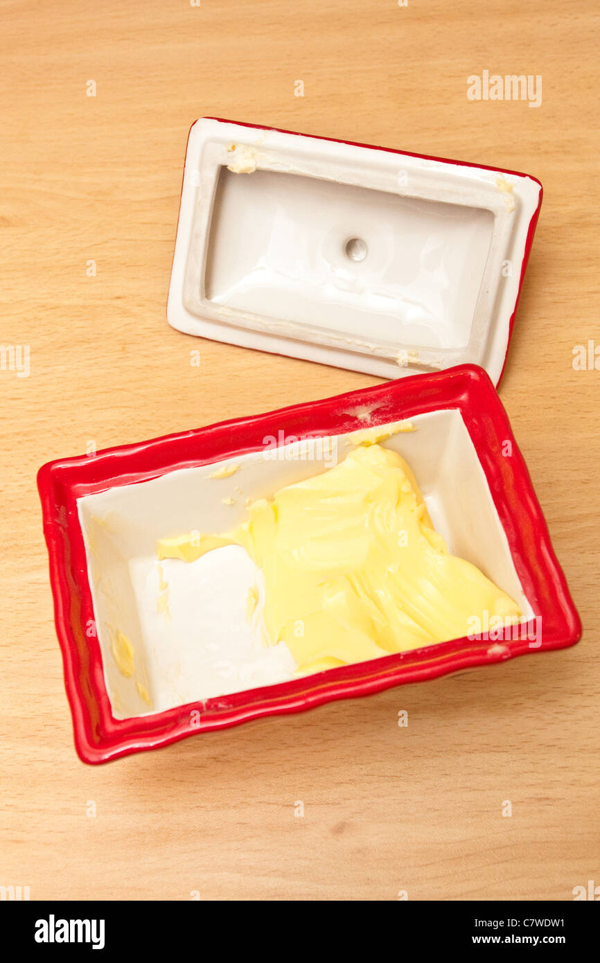 Butter in a butter dish Stock Photo Alamy