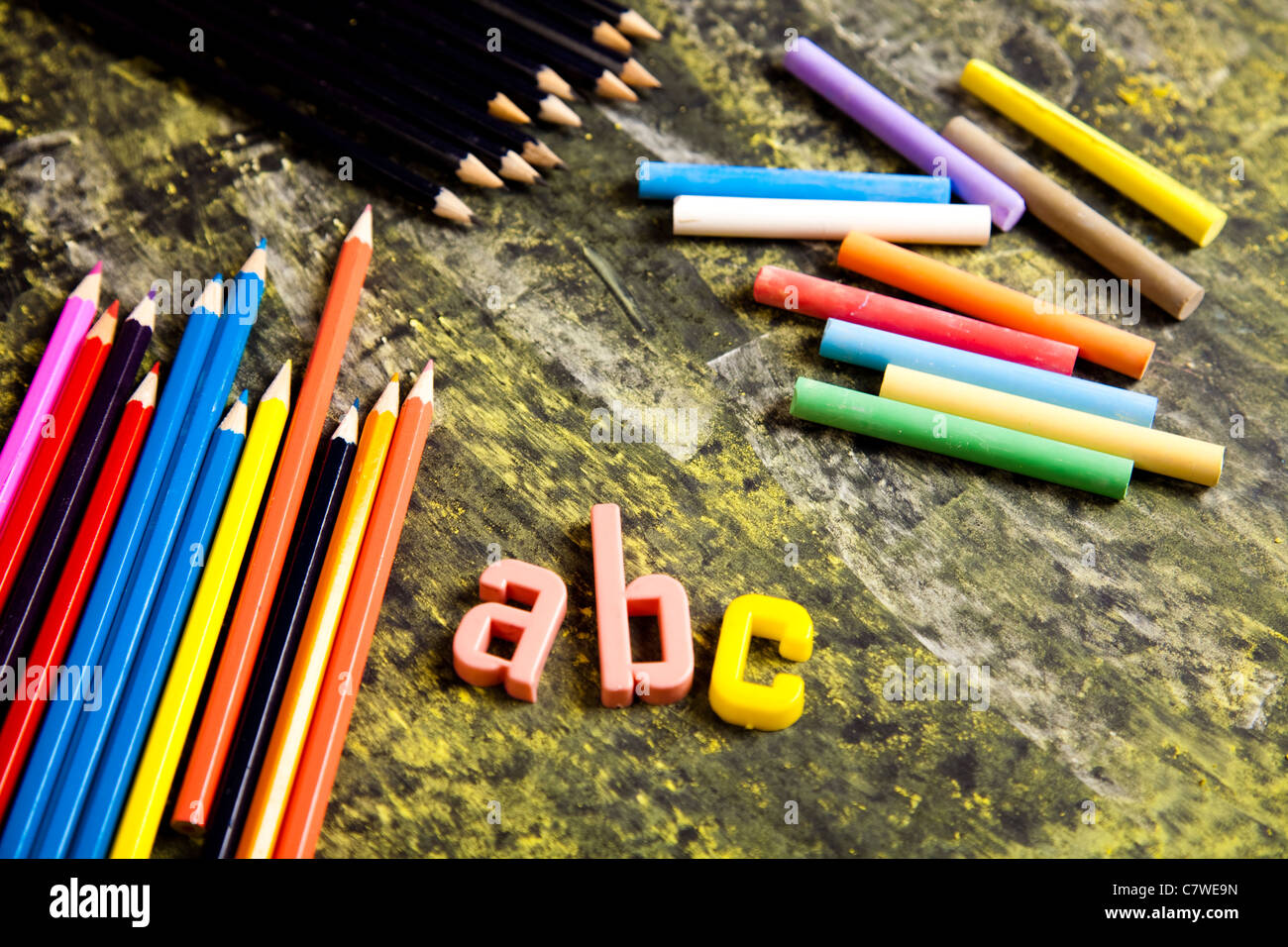 Colour pencils & Chalkboard Stock Photo Alamy