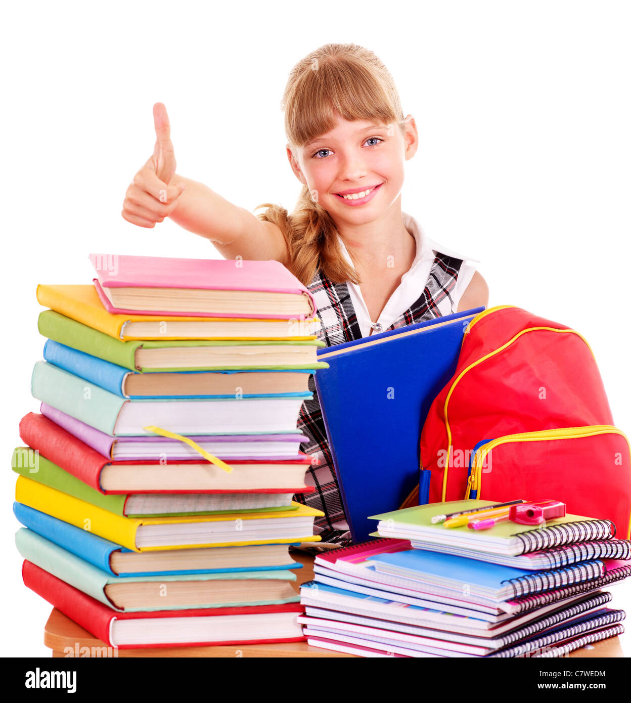 School child holding stack of books Stock Photo - Alamy