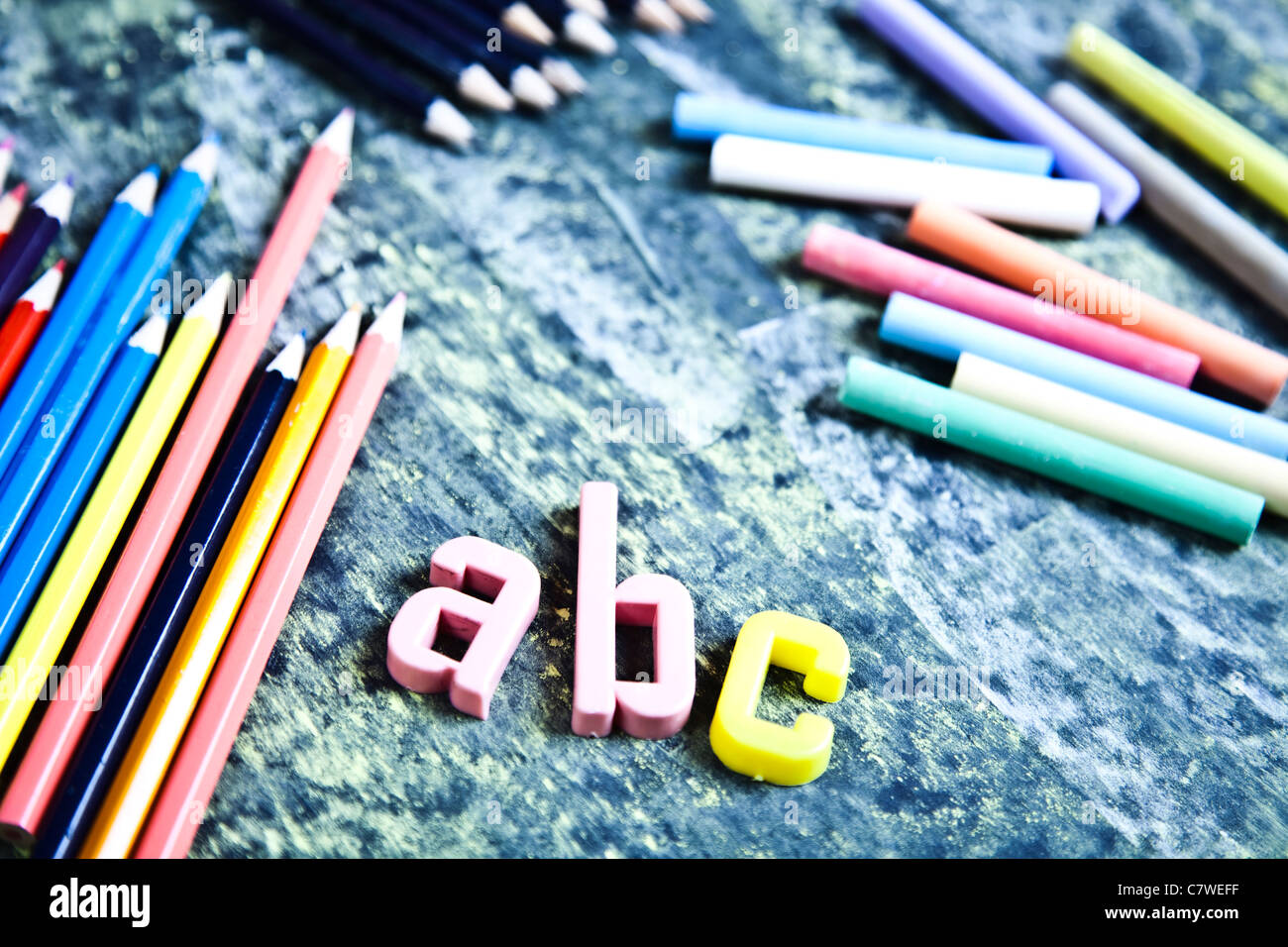 Colour pencils & Chalkboard Stock Photo Alamy