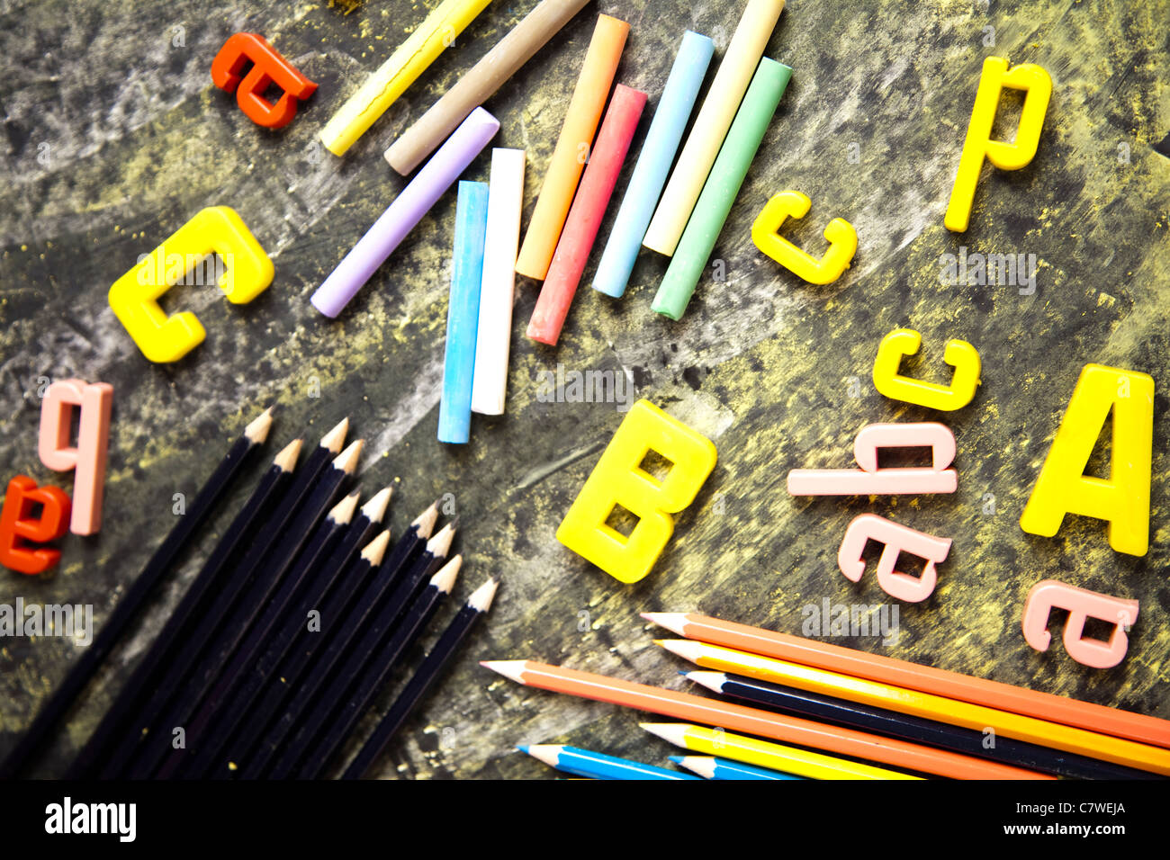 Colour pencils & Chalkboard Stock Photo Alamy