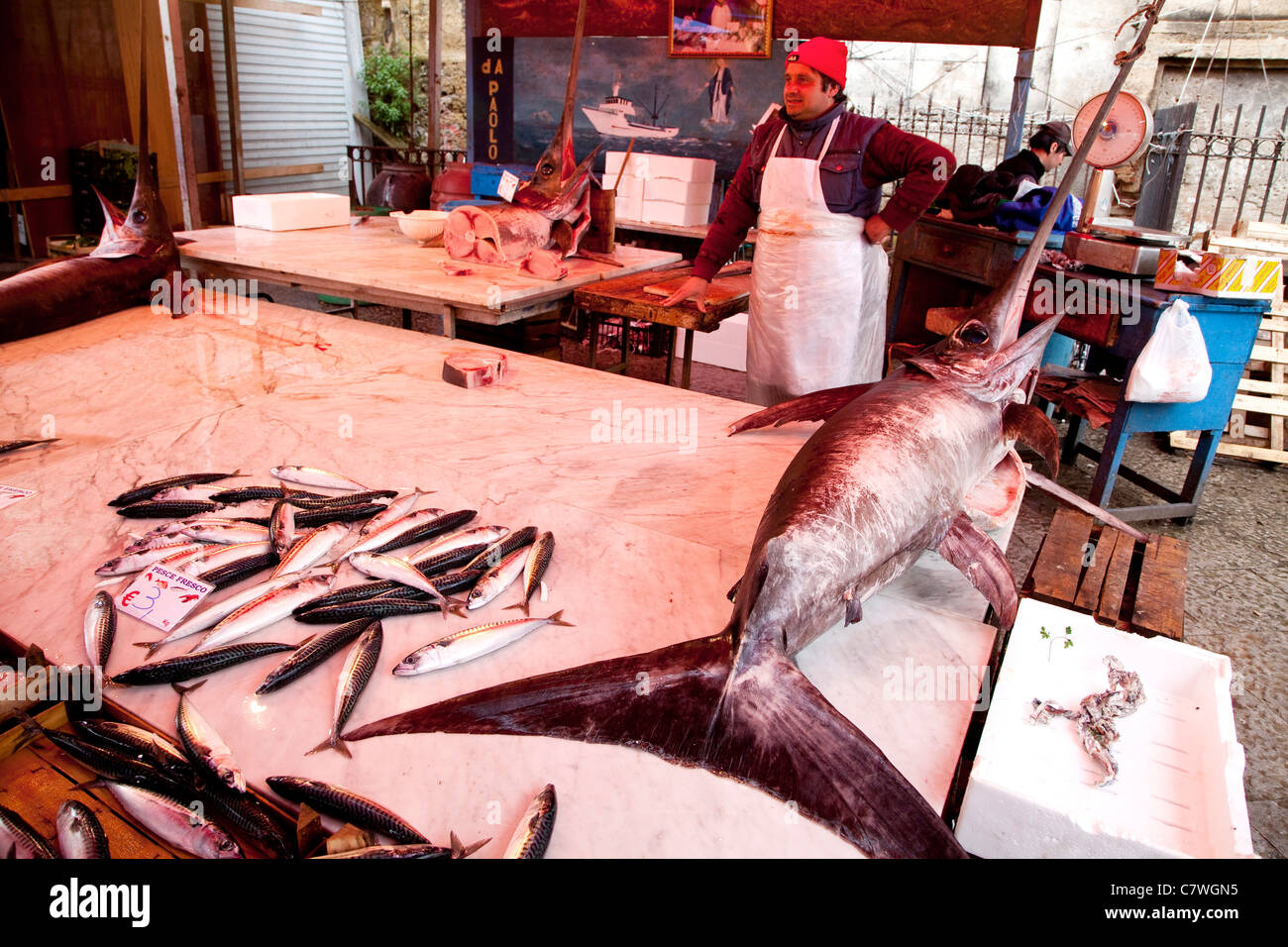 Traditional fish shop selling seafood, fish and swordfish at Ballarò, old market in Palermo, Sicily, Sicilia, Italy Stock Photo