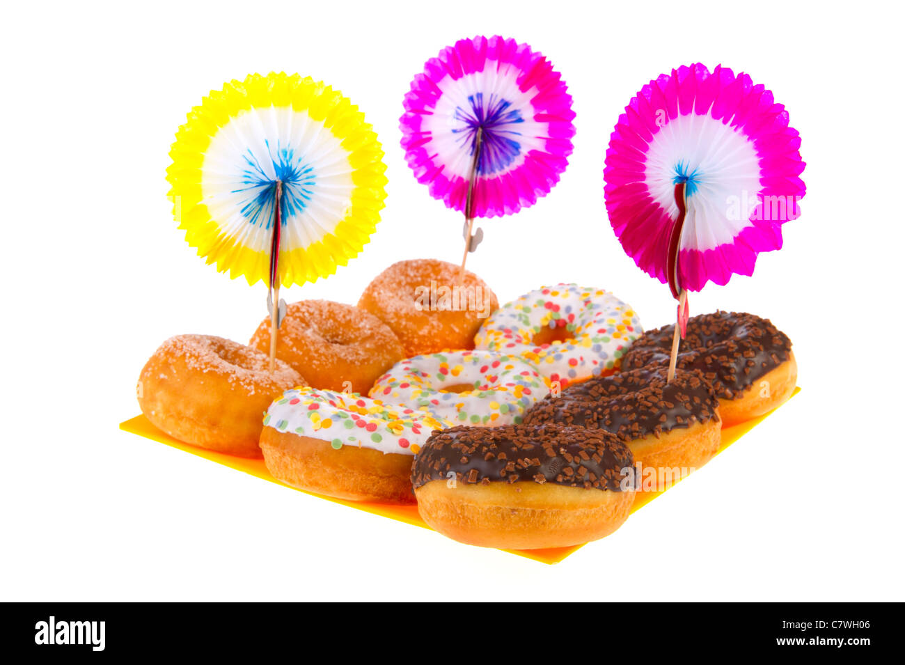 Birthday donuts with colorful glaze isolated over white background ...