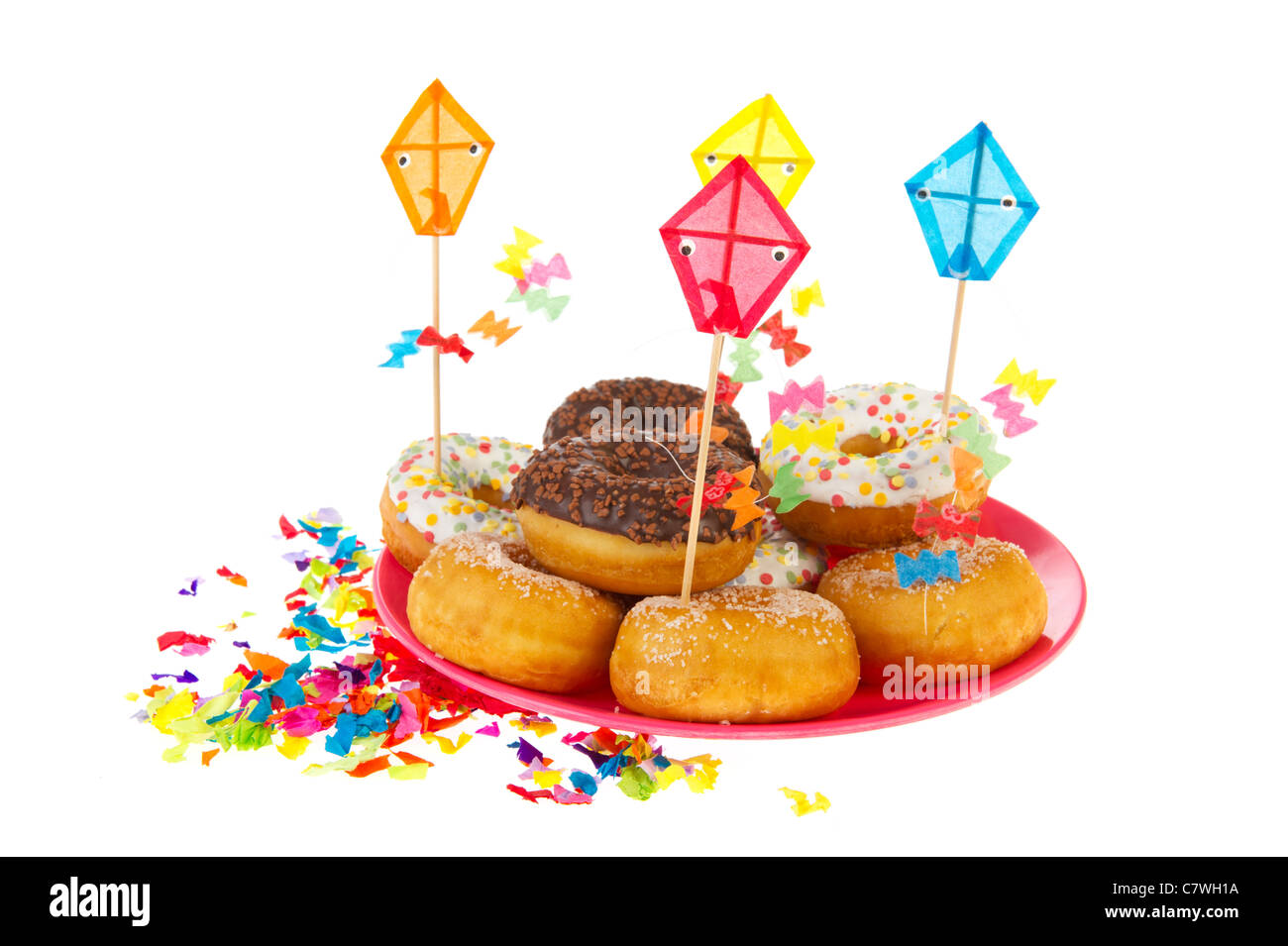 Birthday donuts with colorful glaze isolated over white background ...