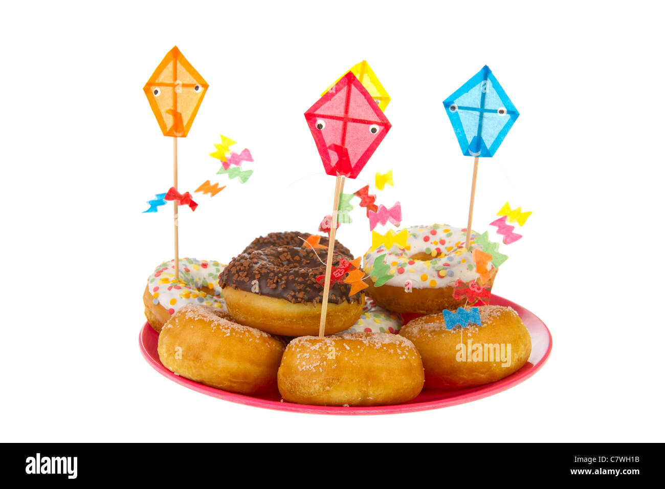 Birthday donuts with colorful glaze isolated over white background ...