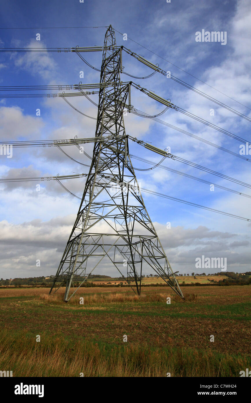 Pylon, pylons, electricity, power, energy, tower, cable, industry,  voltage, steel, high, silhouette, national grid, danger, industrial, network, iron Stock Photo