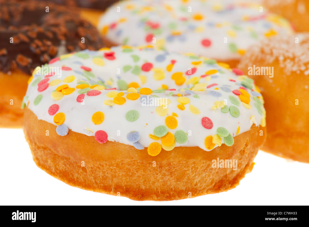 Colorful donuts with confetti and glaze in studio Stock Photo Alamy