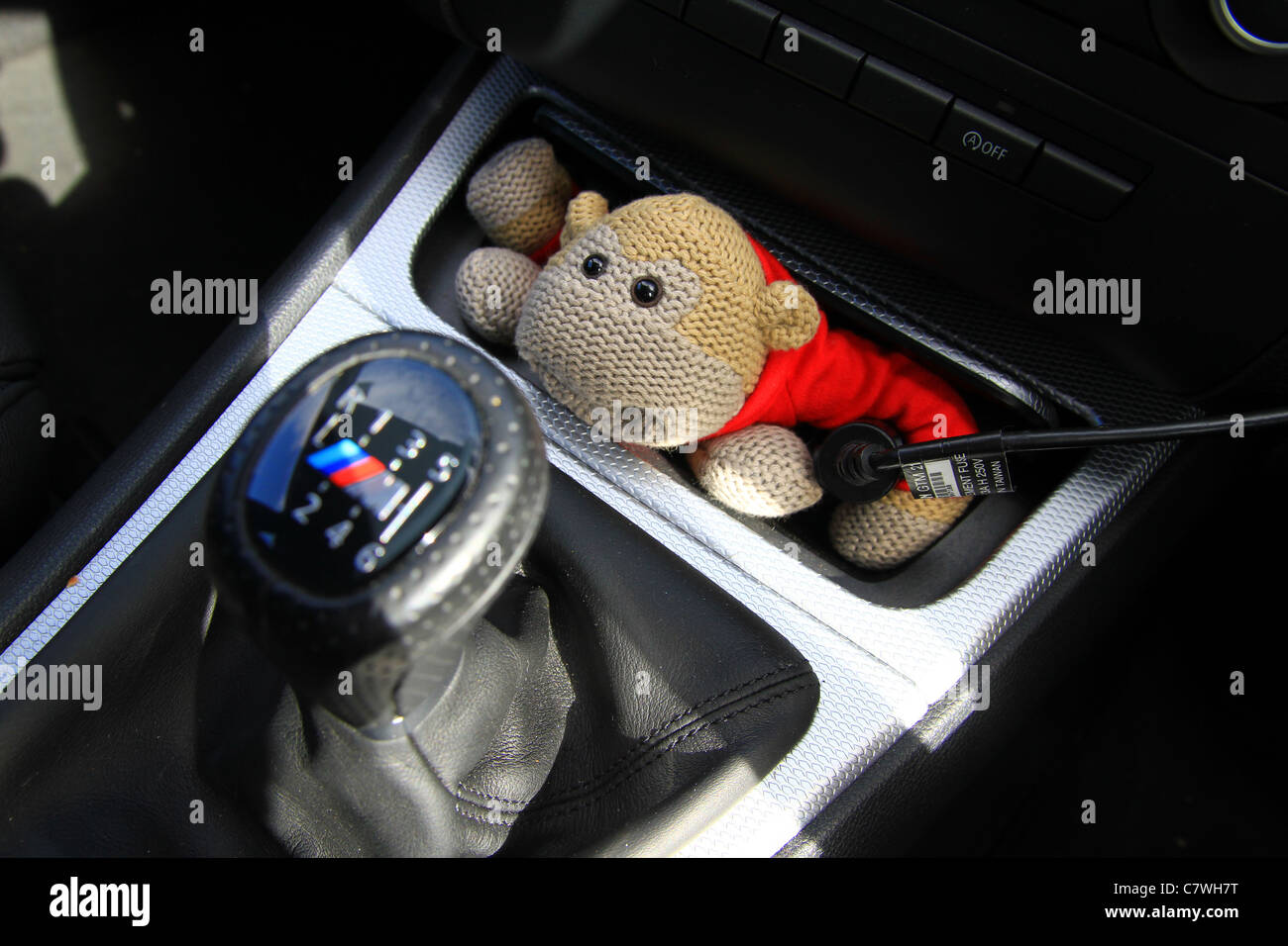 PG Tips monkey hiding in my car, In 2007, PG Tips reunited Johnny Vegas and the popular Monkey character. he's a monkey. Stock Photo