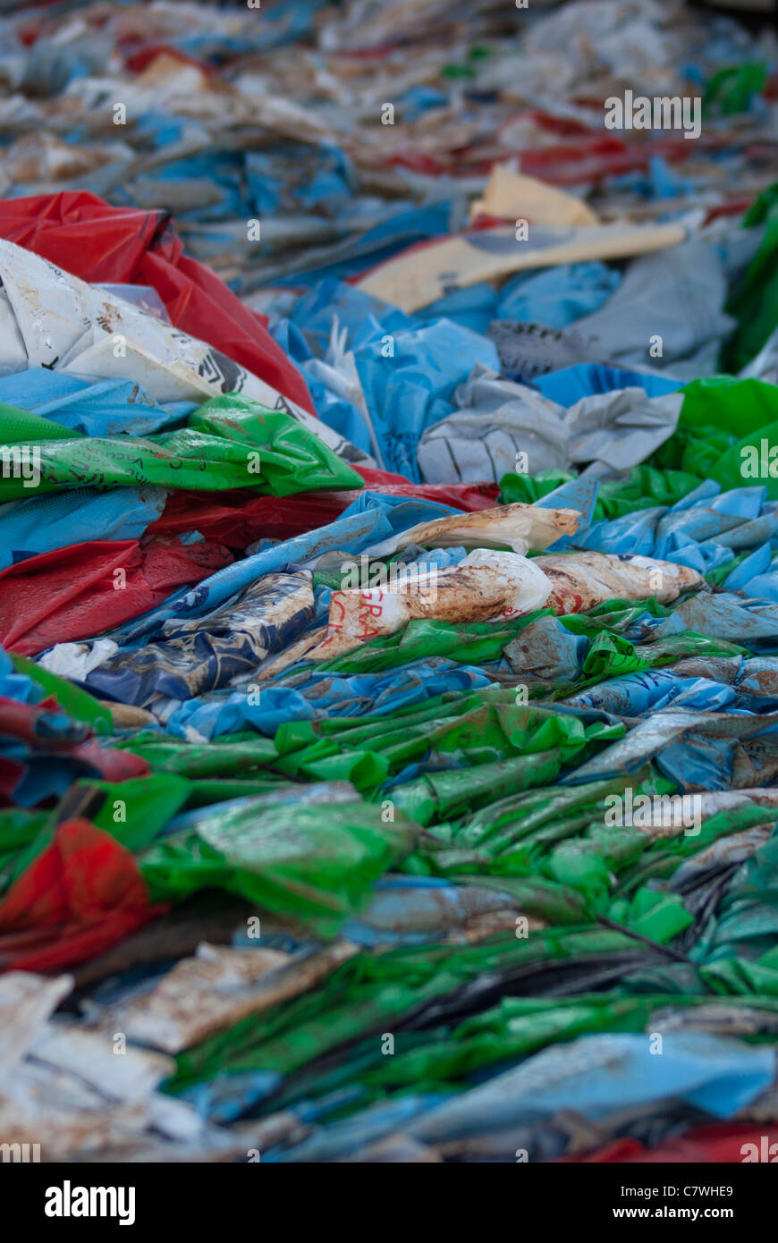Plastic bags bundled for recycling Stock Photo - Alamy