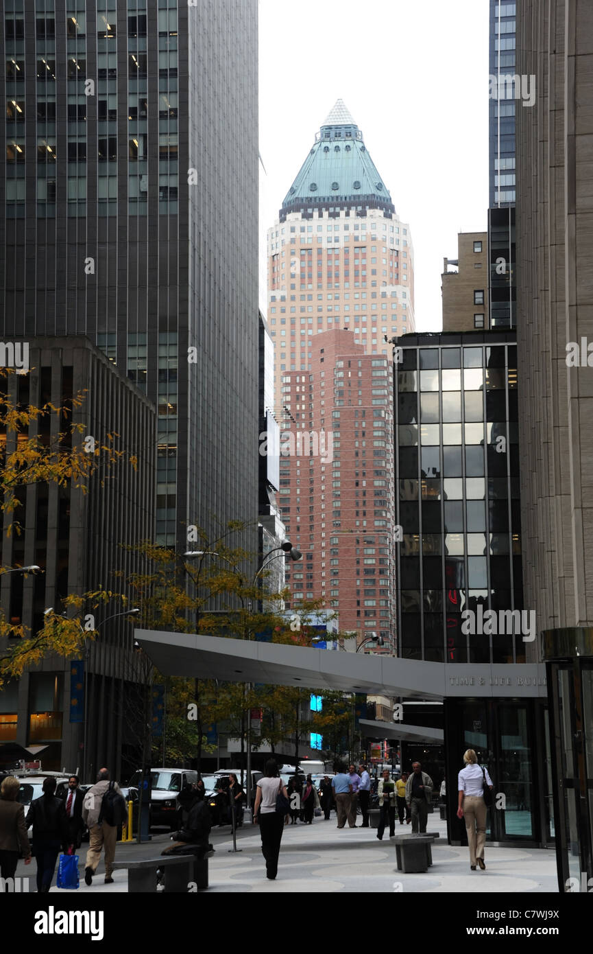 Autumn view, Time Life Building, skyscrapers, parked cars, business people, West 50th Street, towards One World Plaza, New York Stock Photo