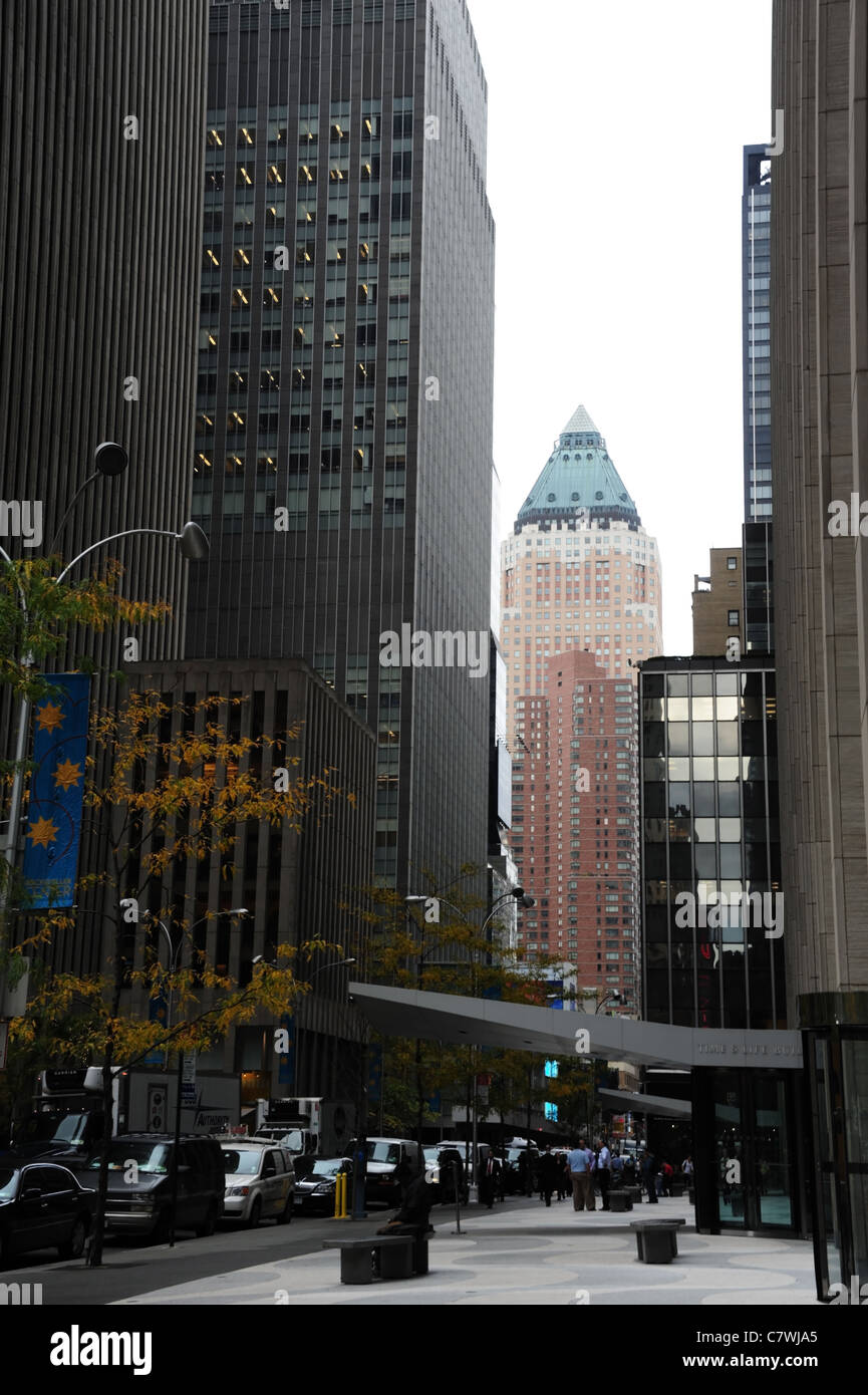Autumn view, Time Life Building, skyscrapers, parked cars, businessmen, West 50th Street, towards One World Plaza, New York Stock Photo